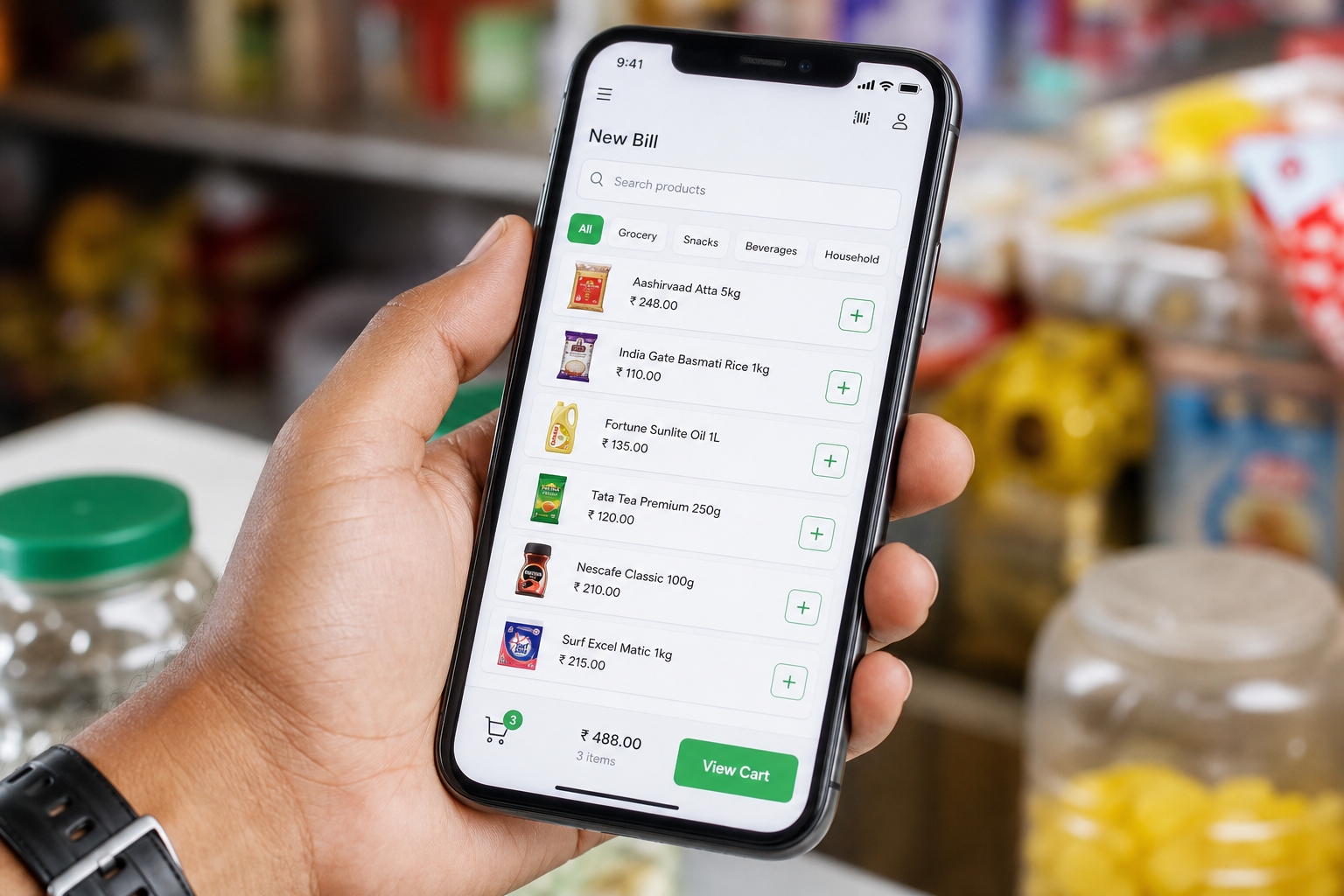 Smartphone showing a fast billing app interface in an Indian shop